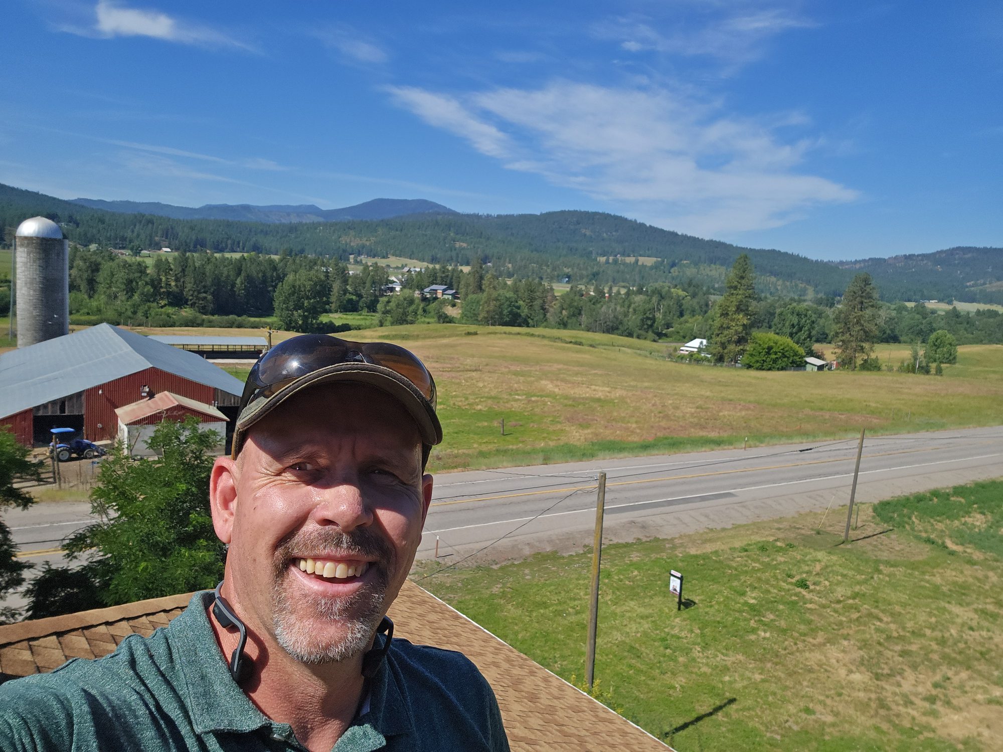 Jim on a roof above the Spokane valley