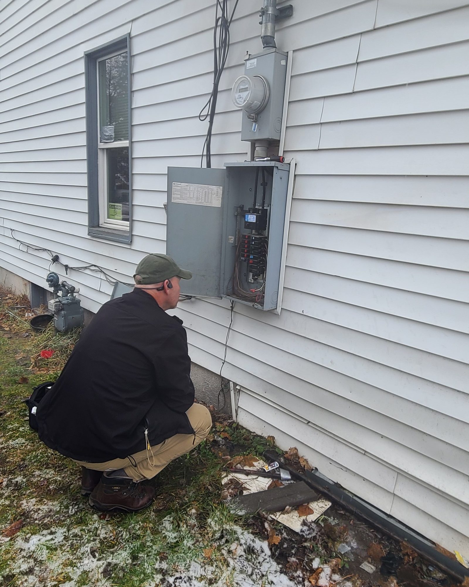 Inspector checking an electrical panel